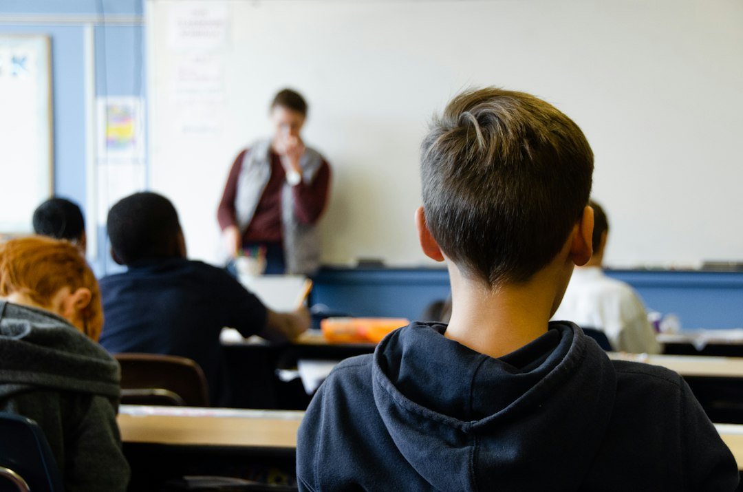 Fifth-grade students working at desks in a classroom